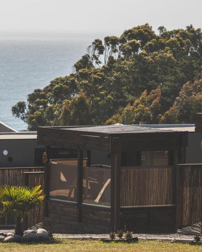 a house with a view of the ocean at Altos de Pichilemu in Pichilemu