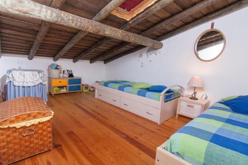 Postel nebo postele na pokoji v ubytování Monte Farropo