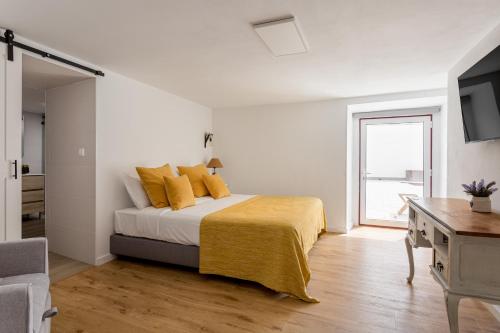 Ένα ή περισσότερα κρεβάτια σε δωμάτιο στο Revive House Camp - Ericeira - Sintra