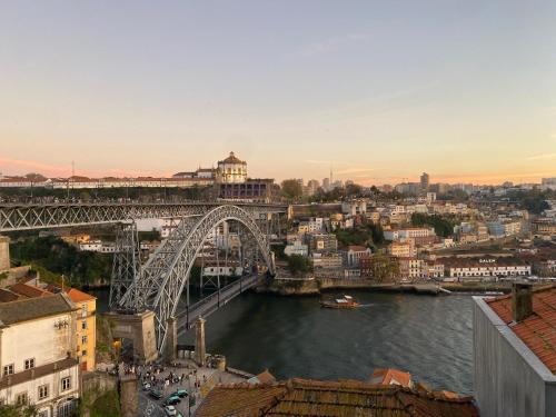 a view of a bridge over a river at Casa Dona Olga River View in Porto