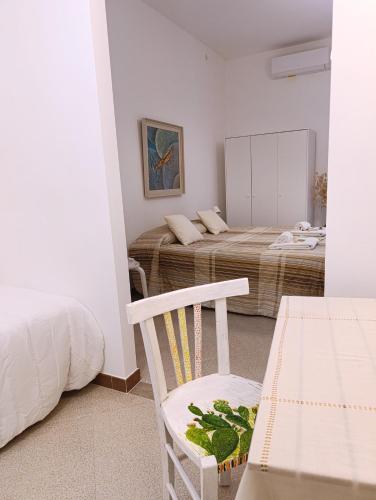 Ένα ή περισσότερα κρεβάτια σε δωμάτιο στο Ficodindia Rooms