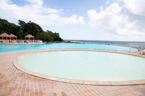 Πισίνα στο ή κοντά στο Le Ti' Paradis tropical, Anse Des Rochers vue Mer Studio25m2