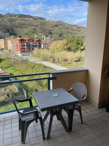 a table and two chairs on a balcony with a view at Affittacamere Da Maria 3 in Albiano