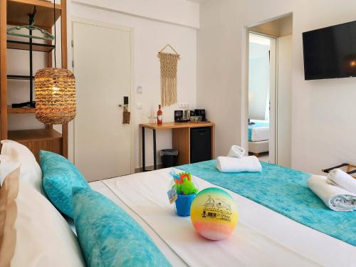 Postel nebo postele na pokoji v ubytování Zoe Boutique Hotel