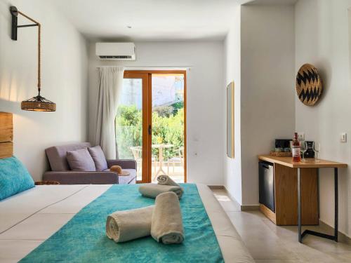 Postel nebo postele na pokoji v ubytování Zoe Boutique Hotel