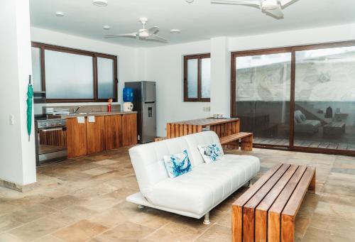 Posezení v ubytování Mi Playa Galapagos Beachfront Apartments