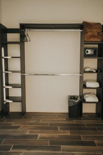 a bedroom with a bunk bed and a closet at Casa Zamora in Villa de Juárez