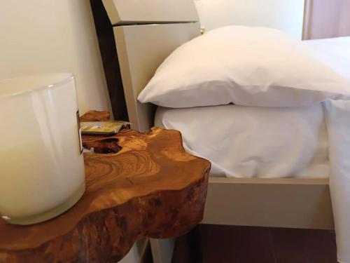 Ένα ή περισσότερα κρεβάτια σε δωμάτιο στο B&B Sunset Suite Belvedere