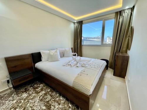 Ένα ή περισσότερα κρεβάτια σε δωμάτιο στο Unique Suite Stay - City Center Downtown