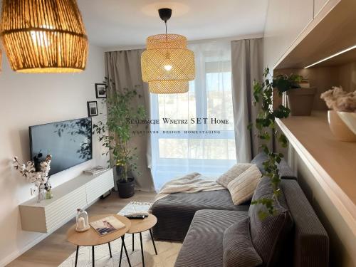 Χώρος καθιστικού στο Apartament premium z widokiem na miasto