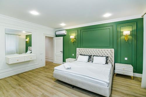 Ένα ή περισσότερα κρεβάτια σε δωμάτιο στο New Deluxe Apartment