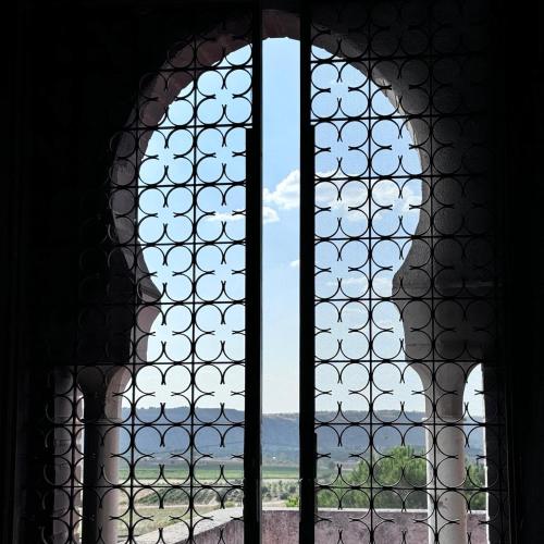 a window with a view of the ocean through it at Torre Calera in Arganda del Rey