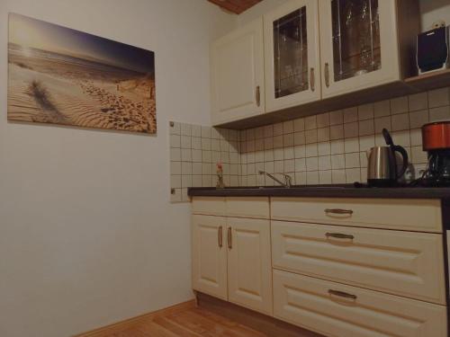Η κουζίνα ή μικρή κουζίνα στο Ferienhaus Nordwind