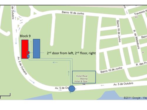 a map with a red box and a blue dot at Village Marina in Olhão