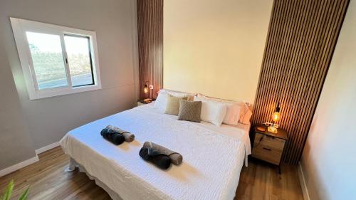Postel nebo postele na pokoji v ubytování Apartment Volcano Beach