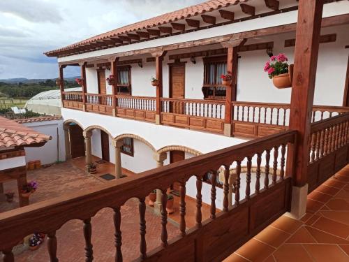 a view from the balcony of a house at Hotel Santa Barbara Sachica in Villa de Leyva