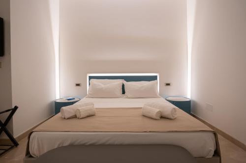 Postel nebo postele na pokoji v ubytování Casa Vossia