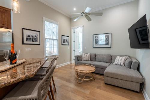 a living room with a couch and a table at American Shoal Light Suite in Key West