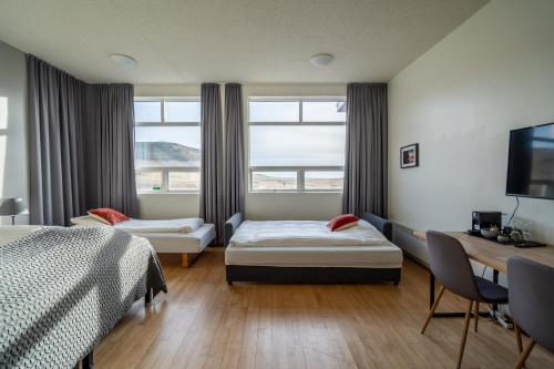 Voodi või voodid majutusasutuse Volcano Hotel toas