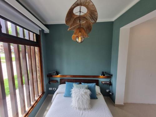 Ένα ή περισσότερα κρεβάτια σε δωμάτιο στο Chalet del Faro