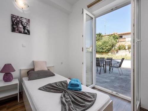 Postel nebo postele na pokoji v ubytování Apartment in Kukci near Spadici Beach