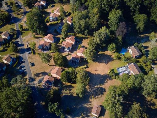 an aerial view of a house with a yard at Villa in France with Private Garden & BBQ in Salles