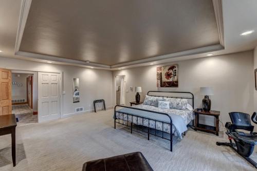 a large bedroom with a bed in a room at Black Hills Nature Retreat, Centrally Located in Keystone