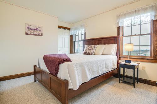 a bedroom with a bed and a window at 4 Mi to the Amish Village Spacious Home with Deck! in Ronks