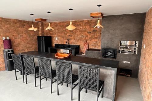 Kuchyň nebo kuchyňský kout v ubytování Casa Almar Garapuá