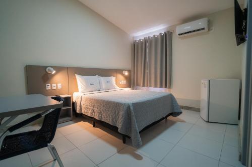 Katil atau katil-katil dalam bilik di Hotel Pousada do Farol