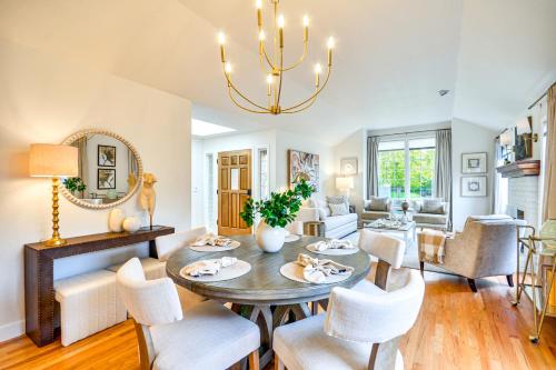 a dining room and living room with a table and chairs at Near Shops and Cafes Beaverton Haven with Luxe Decor! in Beaverton