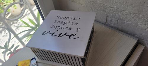 a box with a sign on top of it at Petit House nqn in Neuquén