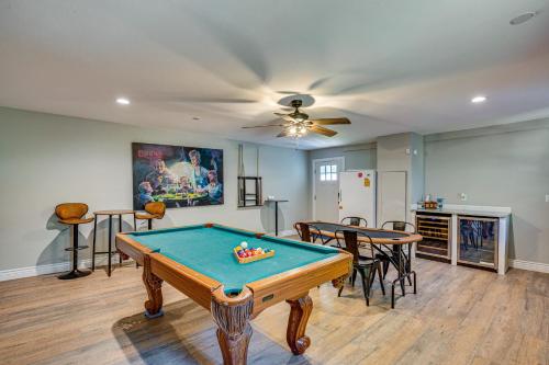 a living room with a pool table in it at Waterfront Retreat with Hot Tub in Gun Barrel City! in Gun Barrel City