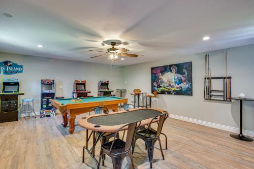 a living room with a ping pong table in it at Waterfront Retreat with Hot Tub in Gun Barrel City! in Gun Barrel City