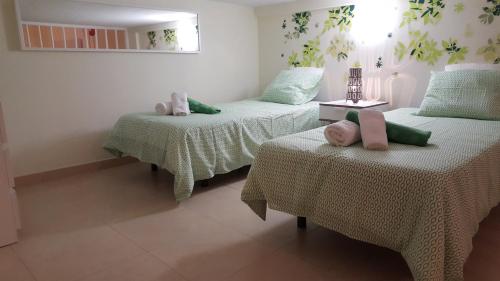 Postel nebo postele na pokoji v ubytování Apartamento Cotillo Playa