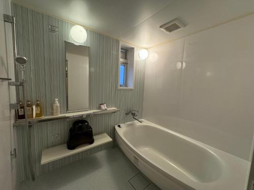 Koupelna v ubytování Hotel RIO新宿