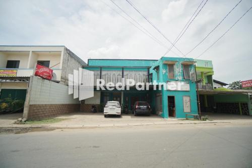 Bangunan di mana terletaknya rumah tamu ini