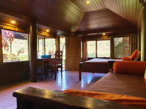 Χώρος καθιστικού στο Jungle Retreat Wayanad