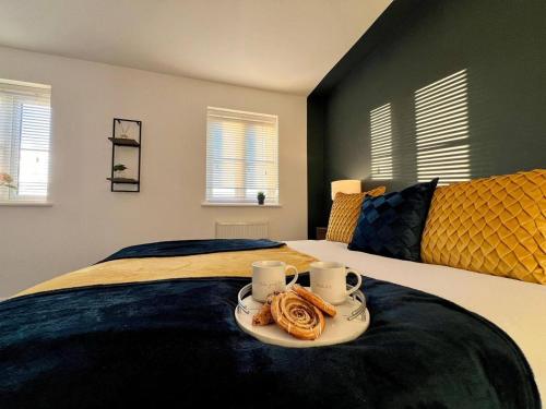 Ένα ή περισσότερα κρεβάτια σε δωμάτιο στο Contractor 4 Bed, Sleeps 7 Long Stay Discount