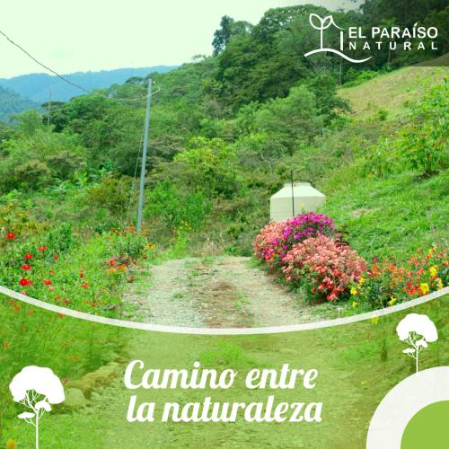 a sign that says canina entrance la naturaleza at El Paraíso Natural in Pejibaye