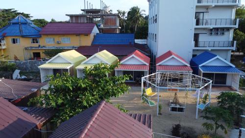 an aerial view of a city with roofs at CORAL in Koh Rong Sanloem