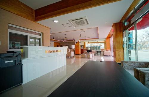 a lobby with a counter in a building at Buan Lavender Pension in Buan