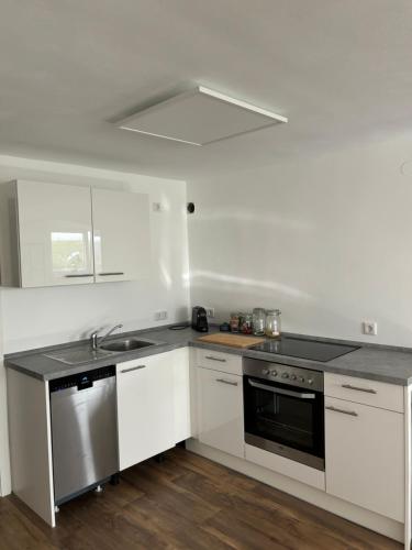 Kuchyň nebo kuchyňský kout v ubytování Gemütliches Apartment
