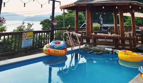 Πισίνα στο ή κοντά στο Bada Jeongwon Pension