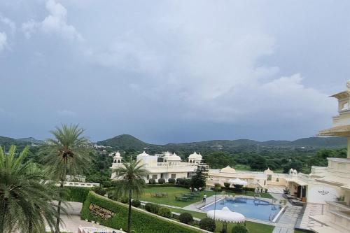 a view of a building with a swimming pool at Labh Garh Palace Resort & Spa in Udaipur