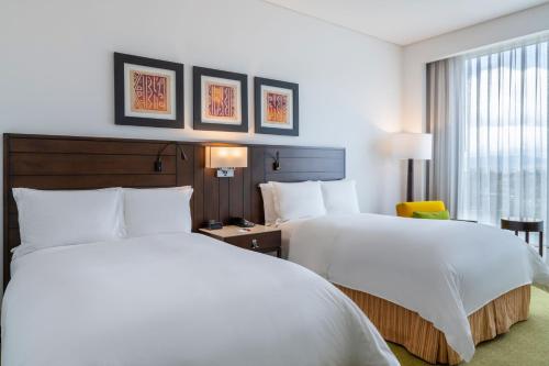 Postel nebo postele na pokoji v ubytování Bogotá Marriott Hotel