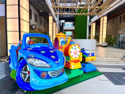 a set of toys in the middle of a building at Hillton Suites in Ayer Keroh
