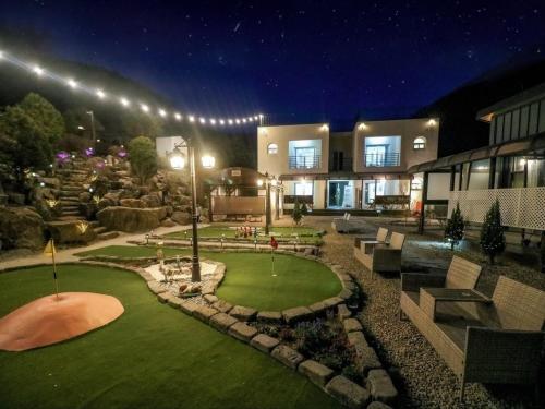 Un jardín fuera de Yangpyeong Notobook Pension