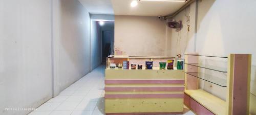 a hallway with stairs in a room at New Jasmine in Karangtengah