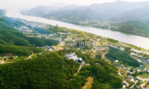 an aerial view of a river valley next to a river at Yangpyeong River Legend in Yangpyeong